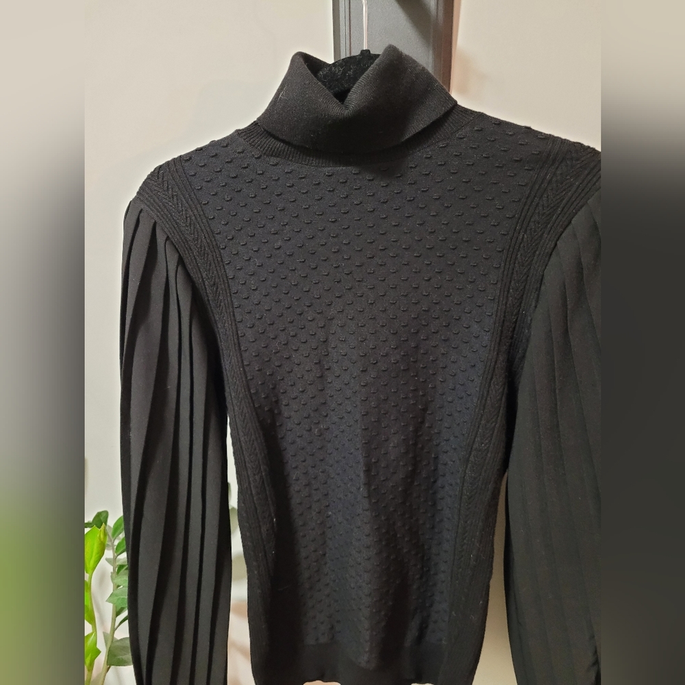 SIZE XS. White House Black Market Black Turtleneck with bell sleeves.